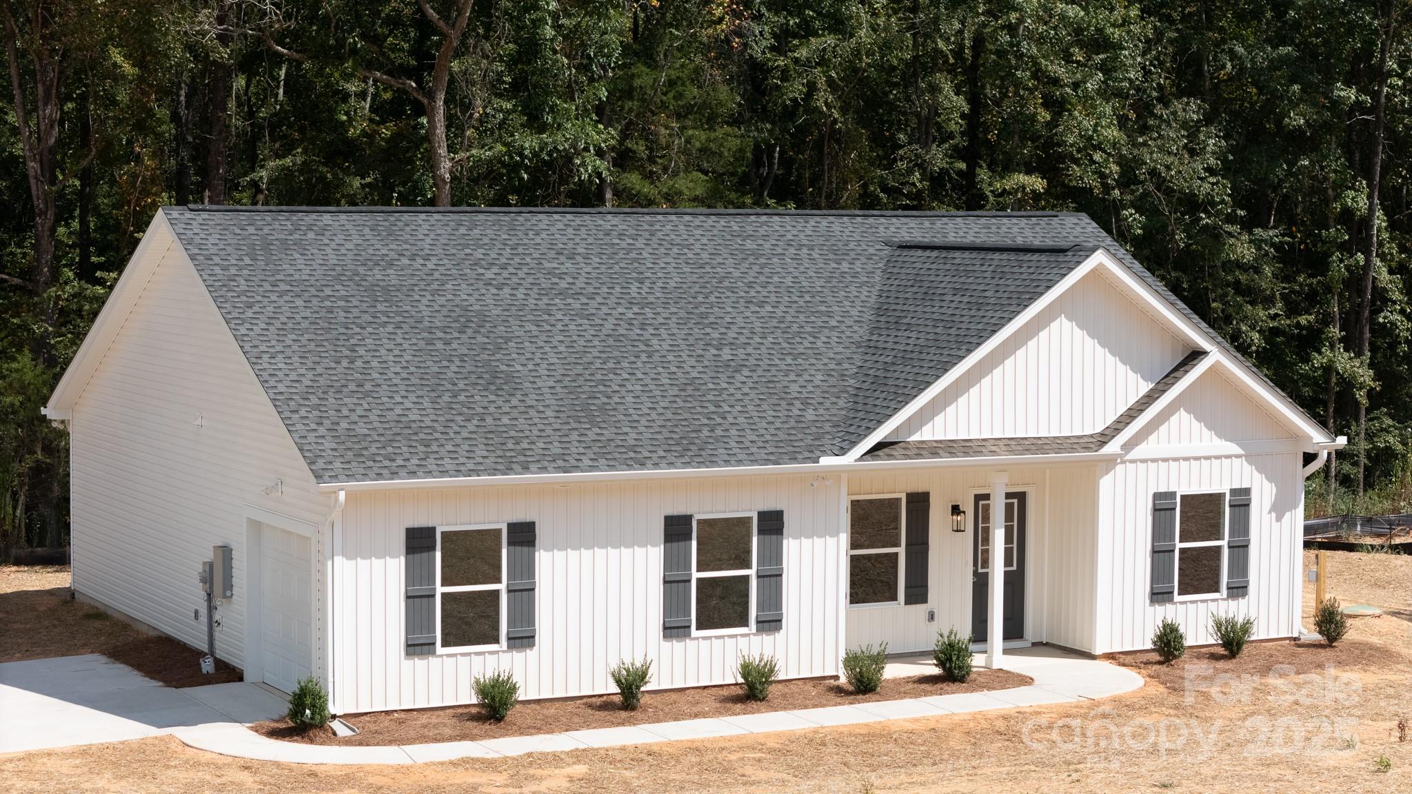 3339 Lesslie Highway, Unit 2 Rock Hill, SC 29730 - Photo 1 of 42 a view of a house with a patio