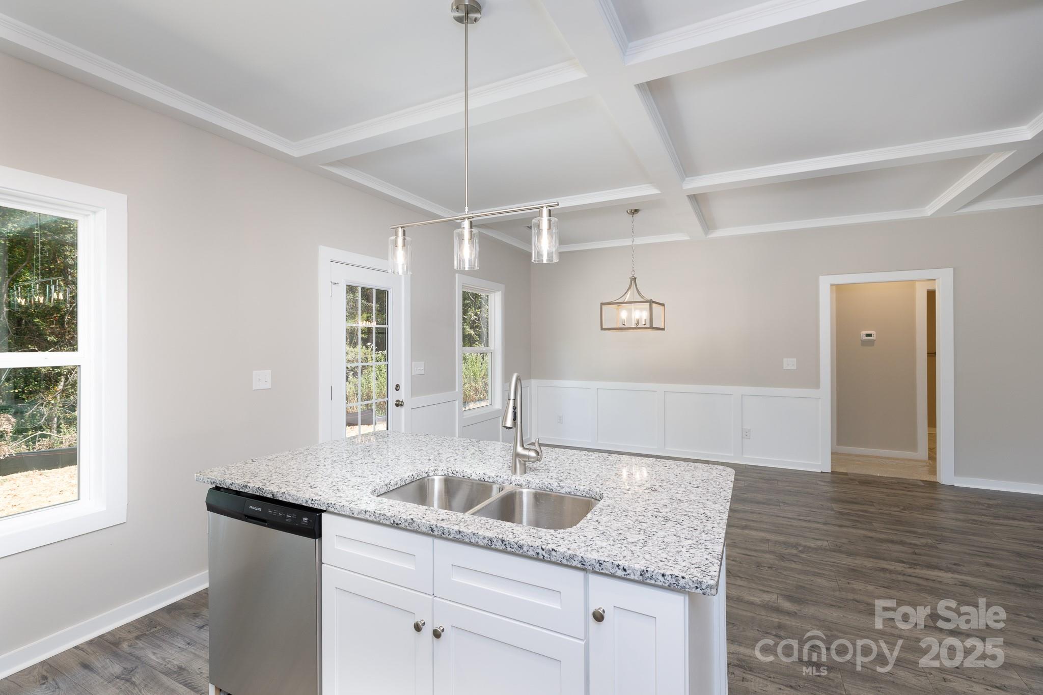 3339 Lesslie Highway, Unit 2 Rock Hill, SC 29730 - Photo 12 of 42 a kitchen with granite countertop a sink window and cabinets