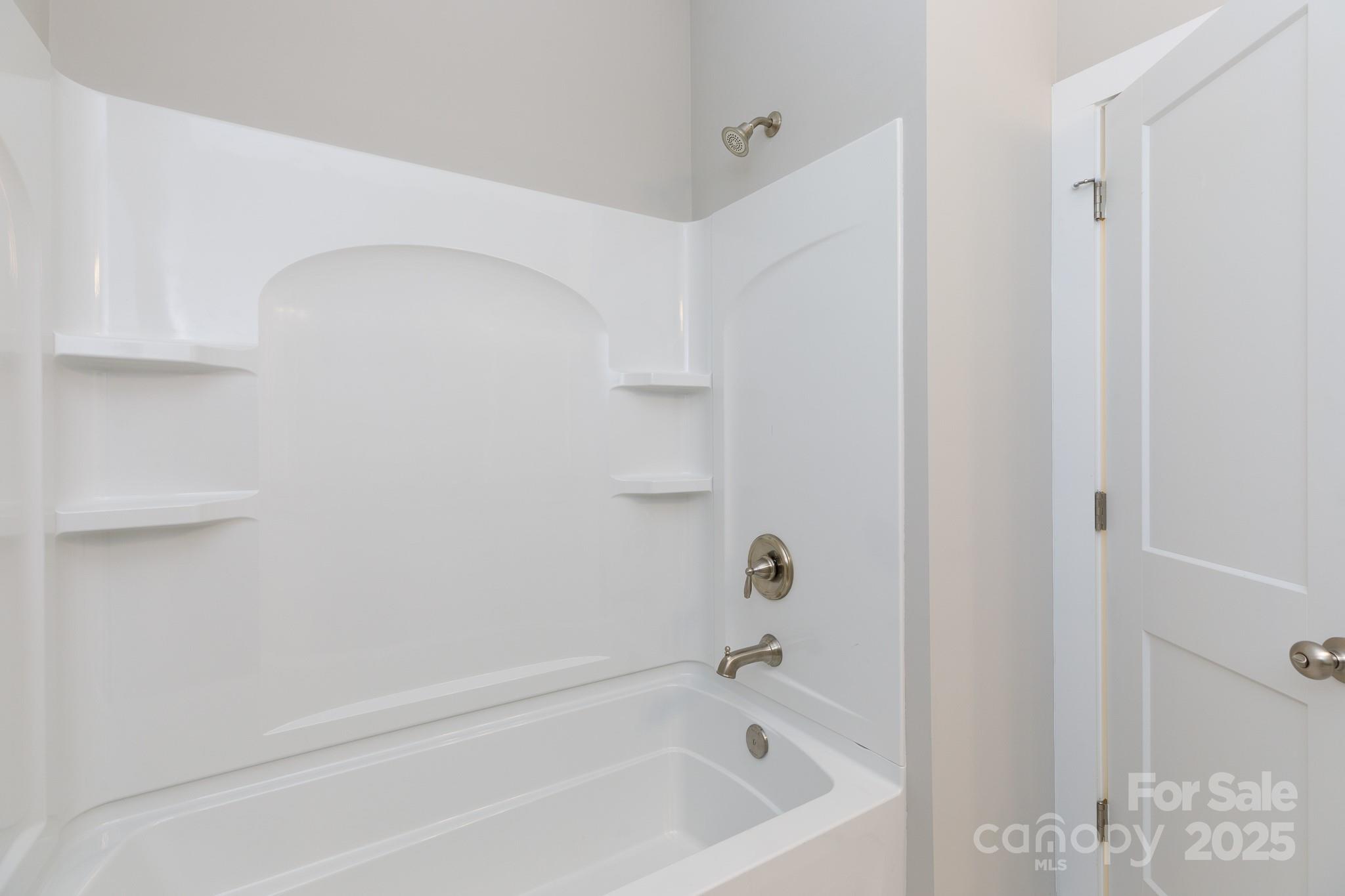 3339 Lesslie Highway, Unit 2 Rock Hill, SC 29730 - Photo 18 of 42 a bathroom with a bathtub