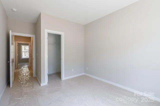 an empty room with mirror