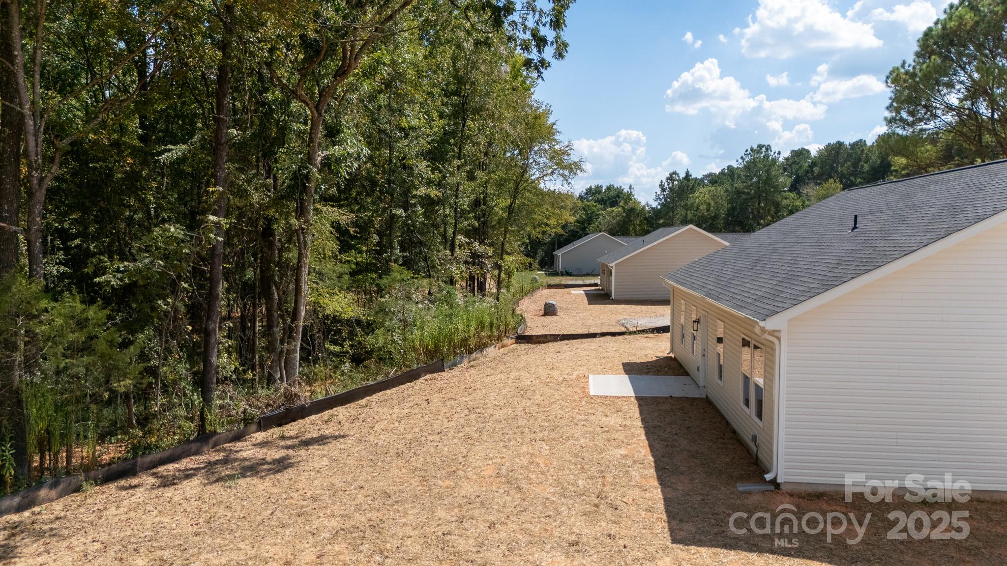 3339 Lesslie Highway, Unit 2 Rock Hill, SC 29730 - Photo 31 of 42 a view of a terrace with a yard