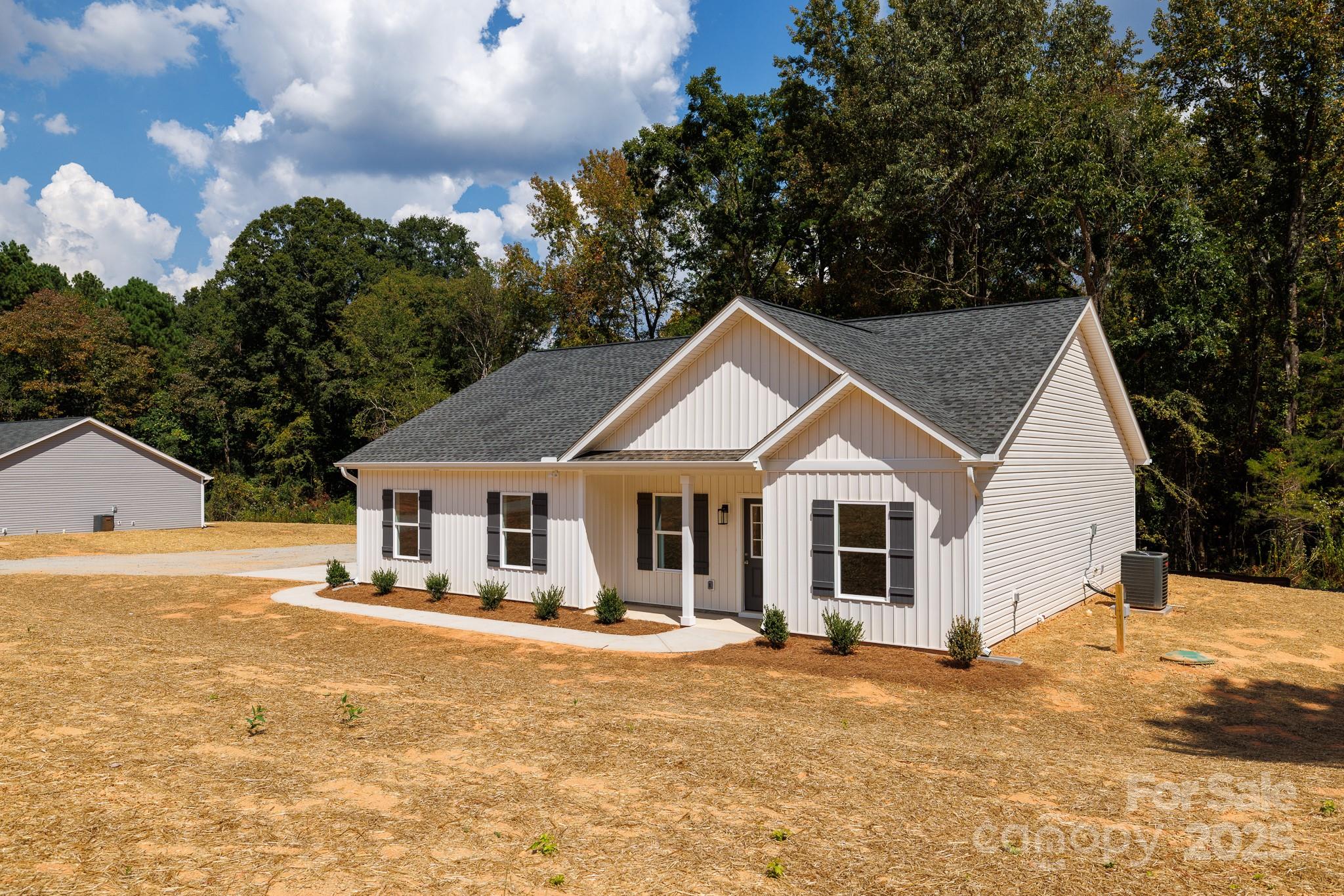 3339 Lesslie Highway, Unit 2 Rock Hill, SC 29730 - Photo 34 of 42 a front view of a house with a yard