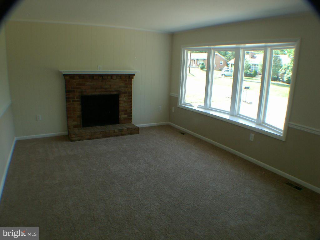 220 Ridge Road Winchester, VA 22602 - Photo 3 of 27 Living Room with wood burning fireplace