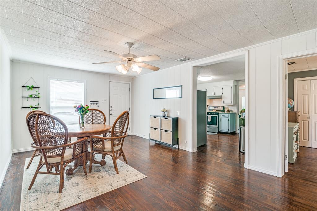 113 Caddo Street Josephine, TX 75173 - Photo 11 of 31 a view of a dining room with furniture and wooden floor