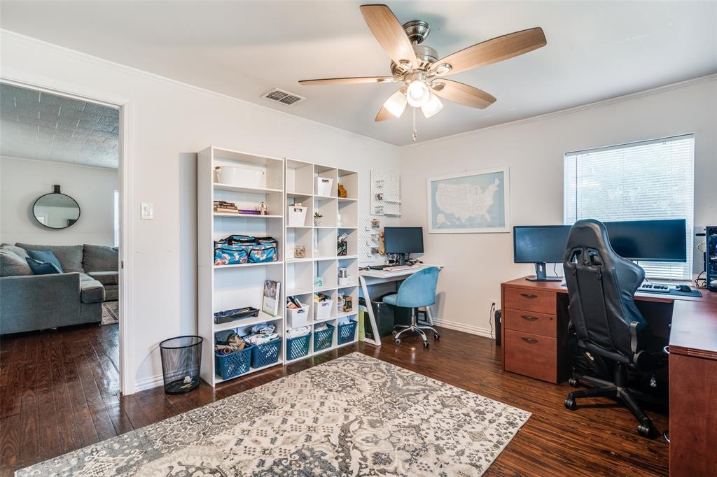113 Caddo Street Josephine, TX 75173 - Photo 13 of 31 a living room with furniture and wooden floor