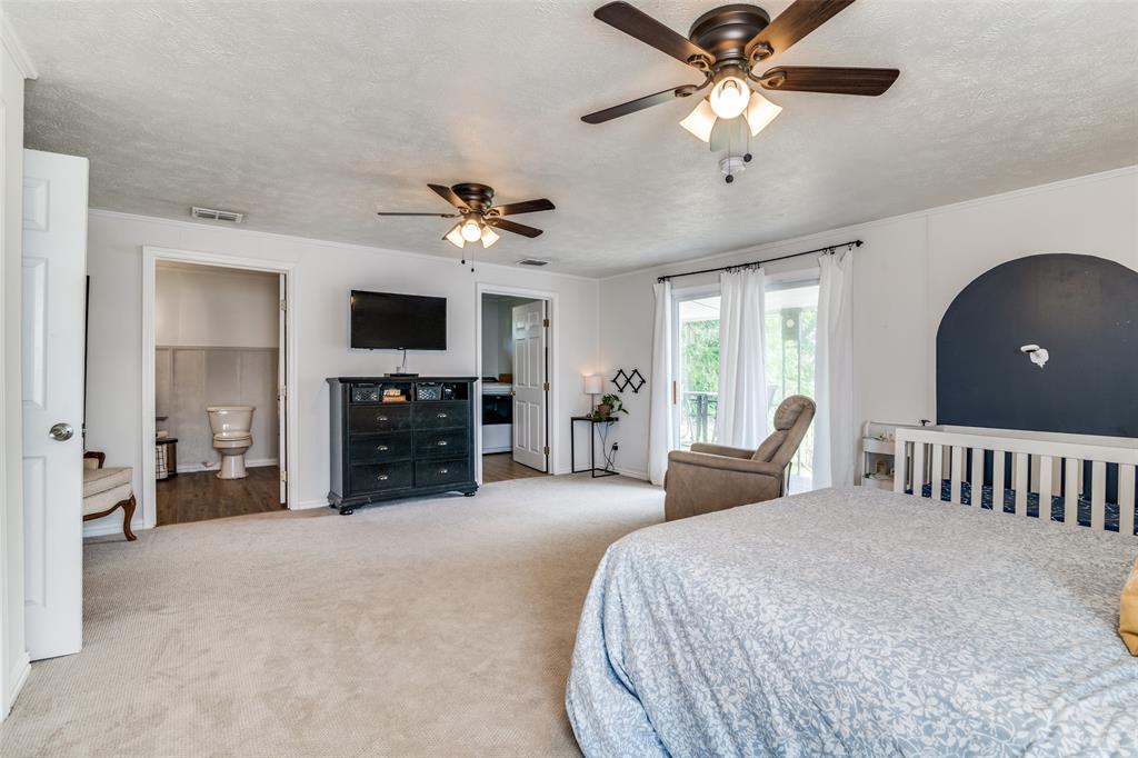 113 Caddo Street Josephine, TX 75173 - Photo 19 of 31 a living room with furniture and a chandelier