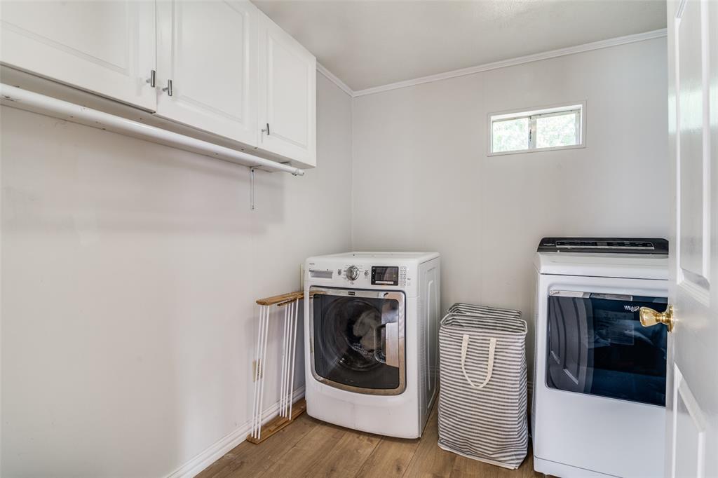 113 Caddo Street Josephine, TX 75173 - Photo 22 of 31 a room with storage and utility