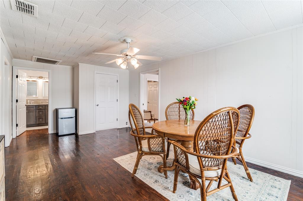 113 Caddo Street Josephine, TX 75173 - Photo 10 of 31 a dining room with furniture a chandelier and wooden floor