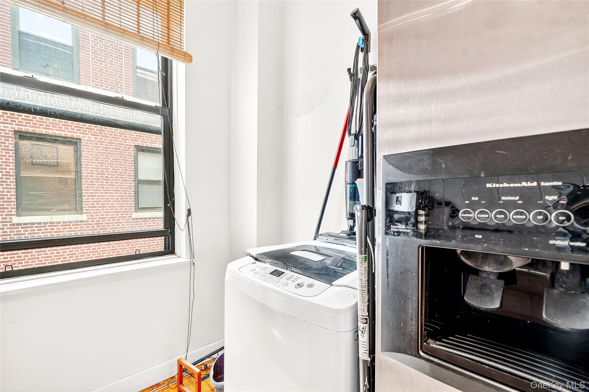 1976 Lafontaine Avenue, Unit 4D Bronx, NY 10457 - Photo 14 of 32 a view of washer and dryer