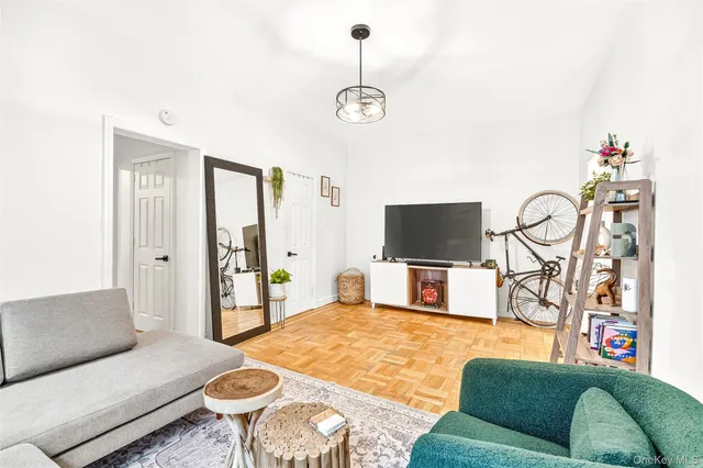 a view of walk in closet with bathroom