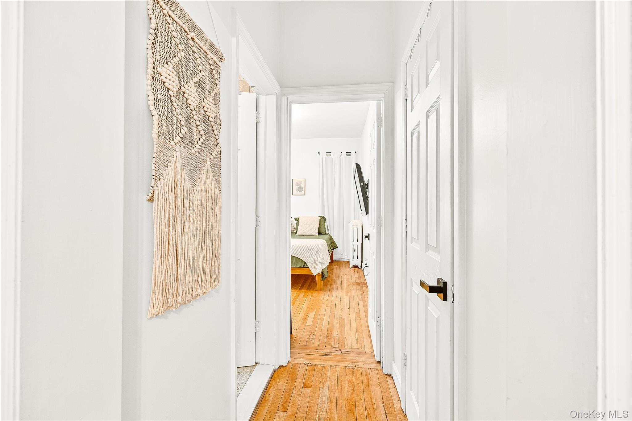 1976 Lafontaine Avenue, Unit 4D Bronx, NY 10457 - Photo 25 of 32 a view of walk in closet with bathroom