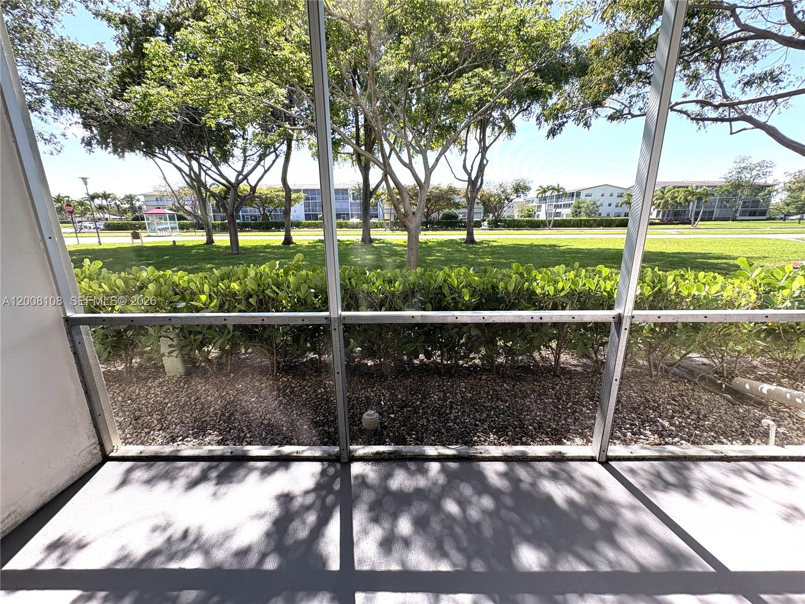 254 Mansfield H, Unit 254 Boca Raton, FL 33434 - Photo 13 of 17 Screened Patio