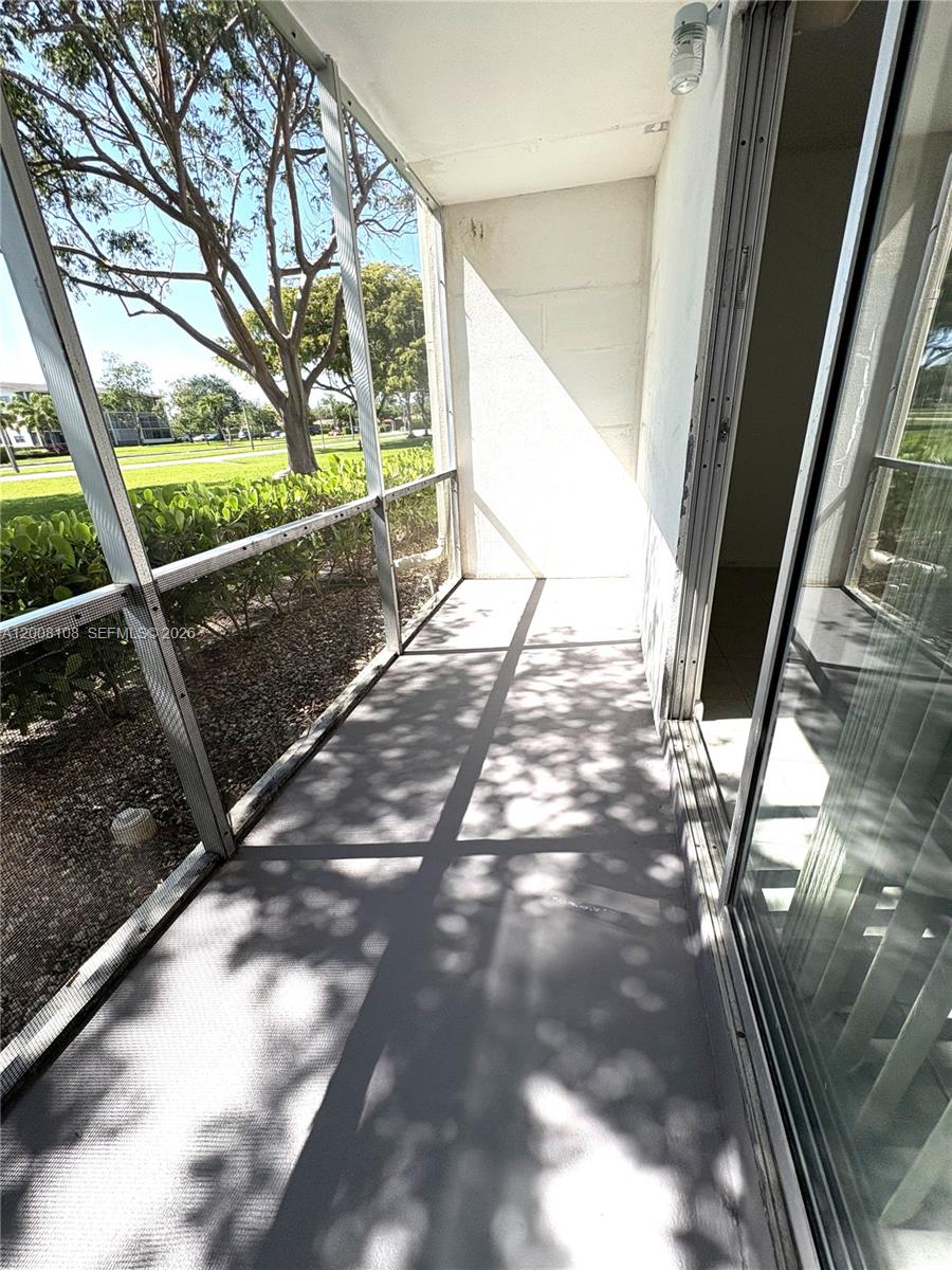 254 Mansfield H, Unit 254 Boca Raton, FL 33434 - Photo 14 of 17 Screened Patio