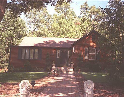 218 Fan Hill Road Monroe, CT 06468 - Photo 1 of 1 a backyard of a house with table and chairs