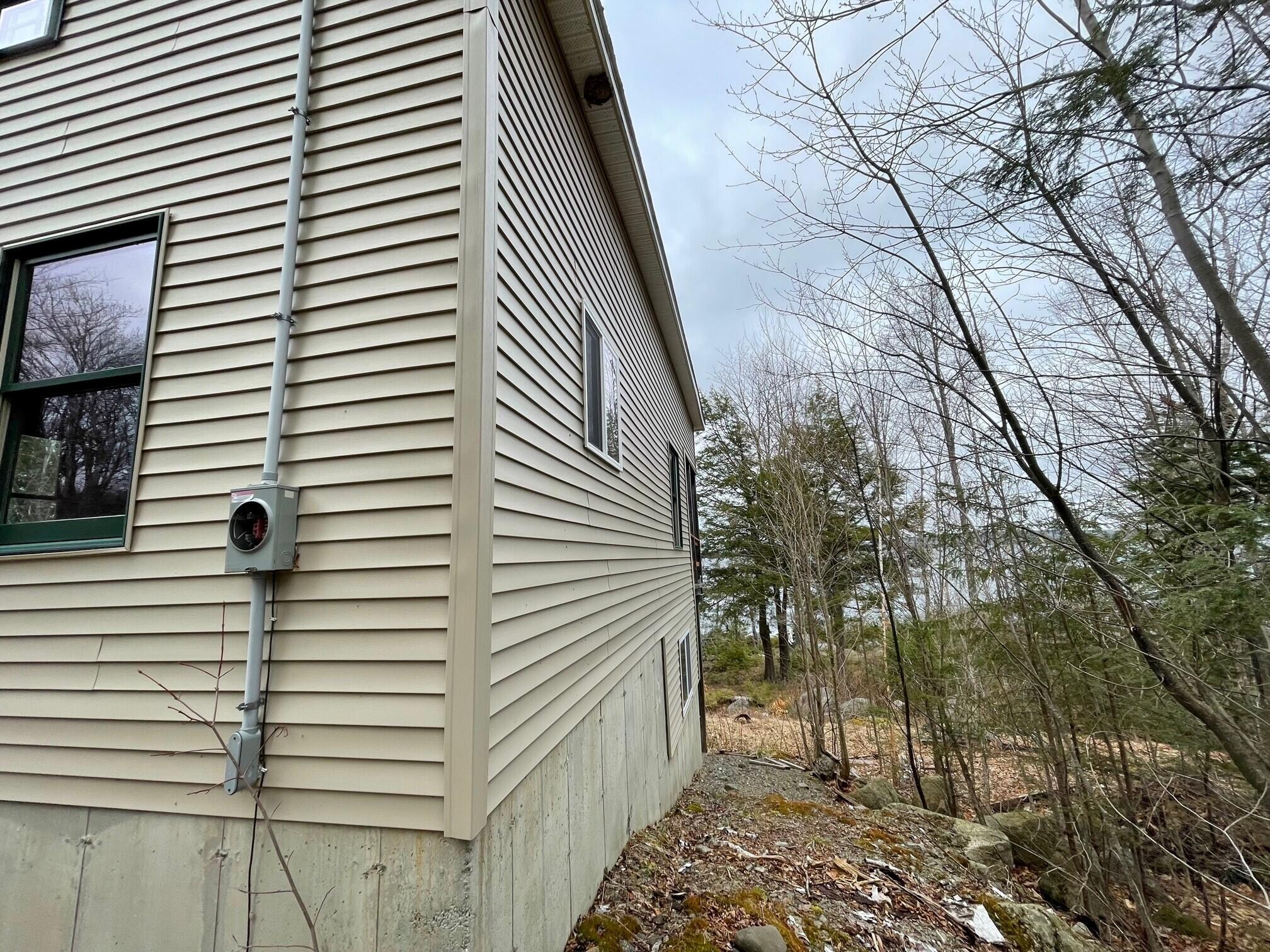 391 Boulder Road Danforth, ME 04424 - Photo 10 of 25 Exterior Photo (South Wall)