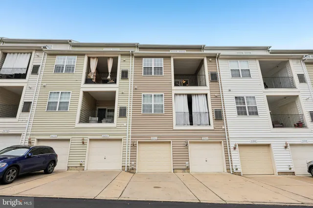 a view of a building with a parking space