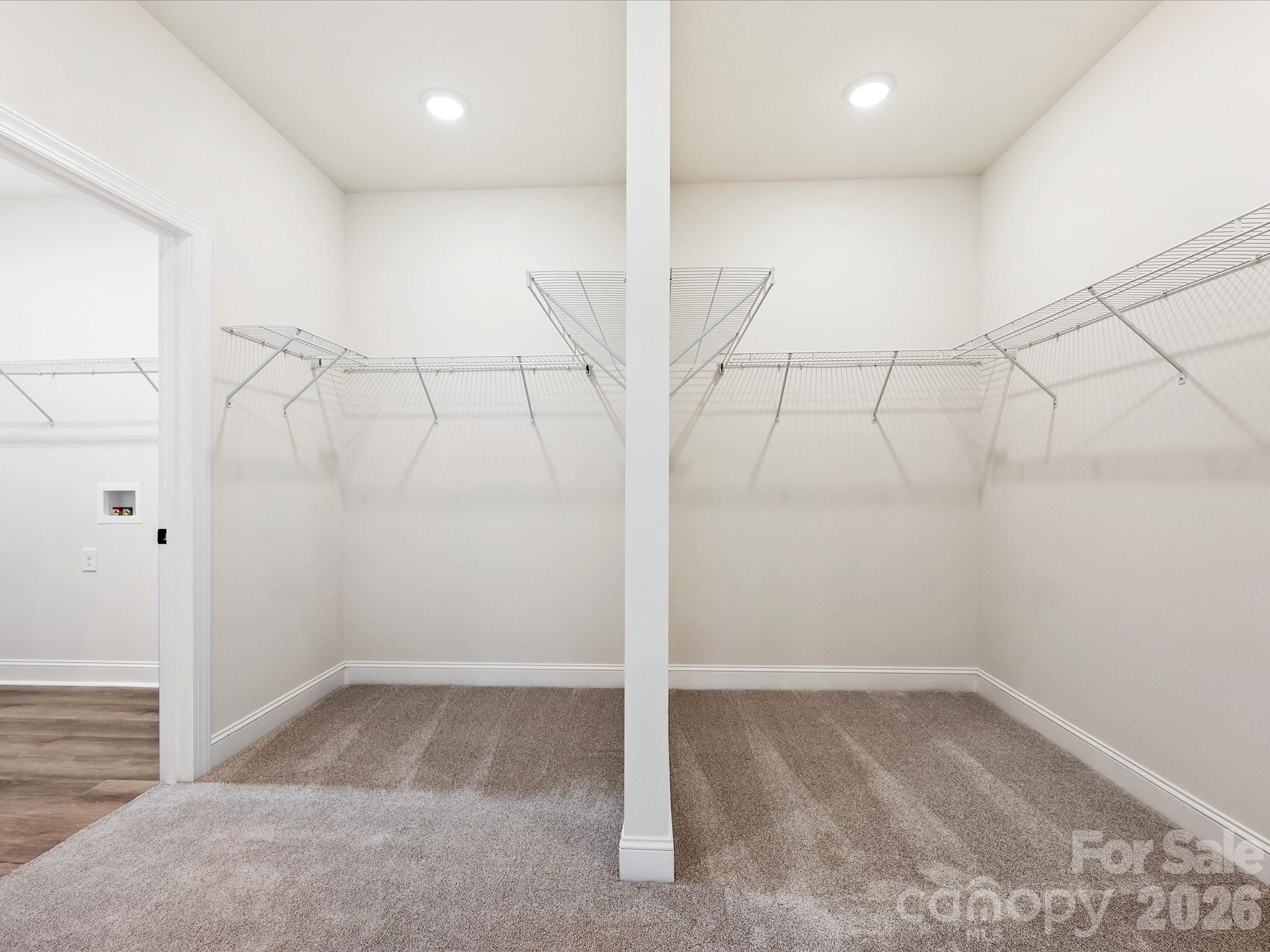 1296 Archer Loop Monroe, NC 28110 - Photo 22 of 39 a view of a room with racks on the wall