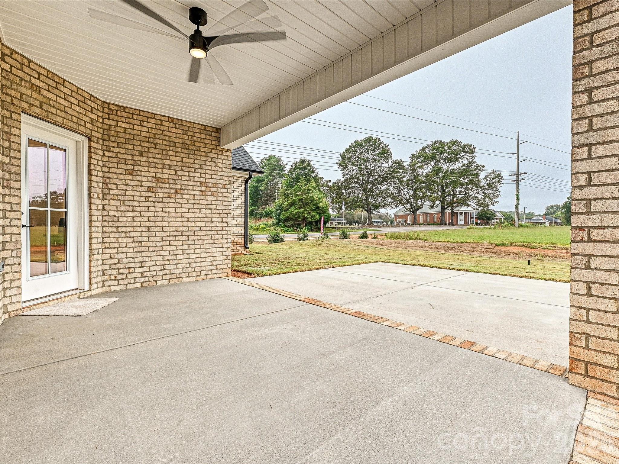 1296 Archer Loop Monroe, NC 28110 - Photo 34 of 39 a view of a livingroom with a yard and furniture