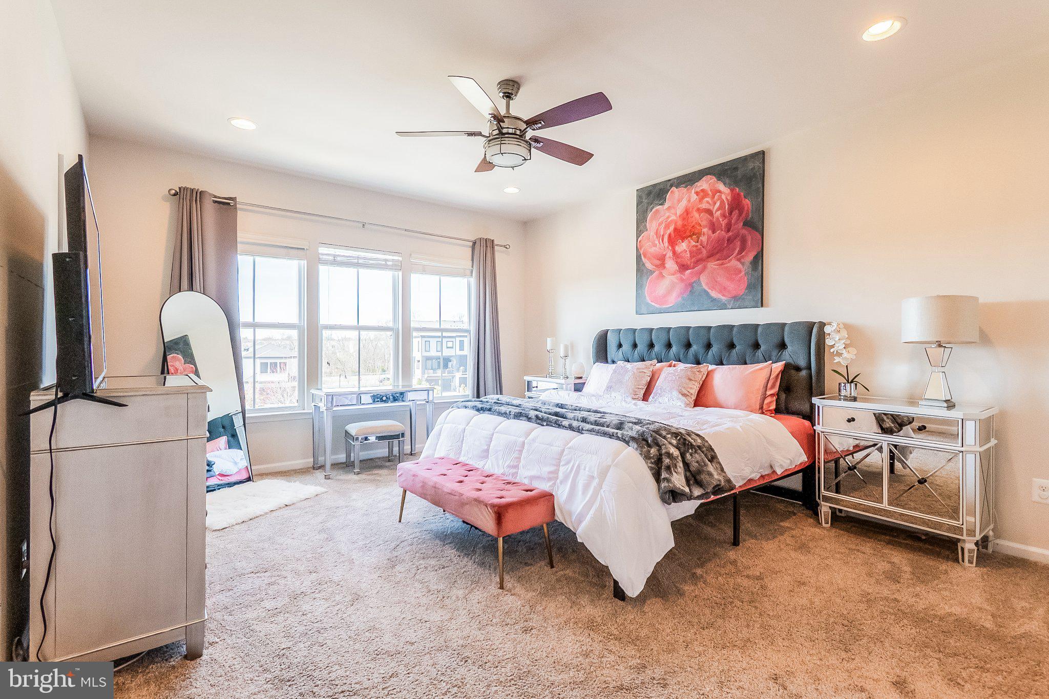 20401 Codman Drive Ashburn, VA 20147 - Photo 11 of 20 Serene bedroom with vibrant decor.