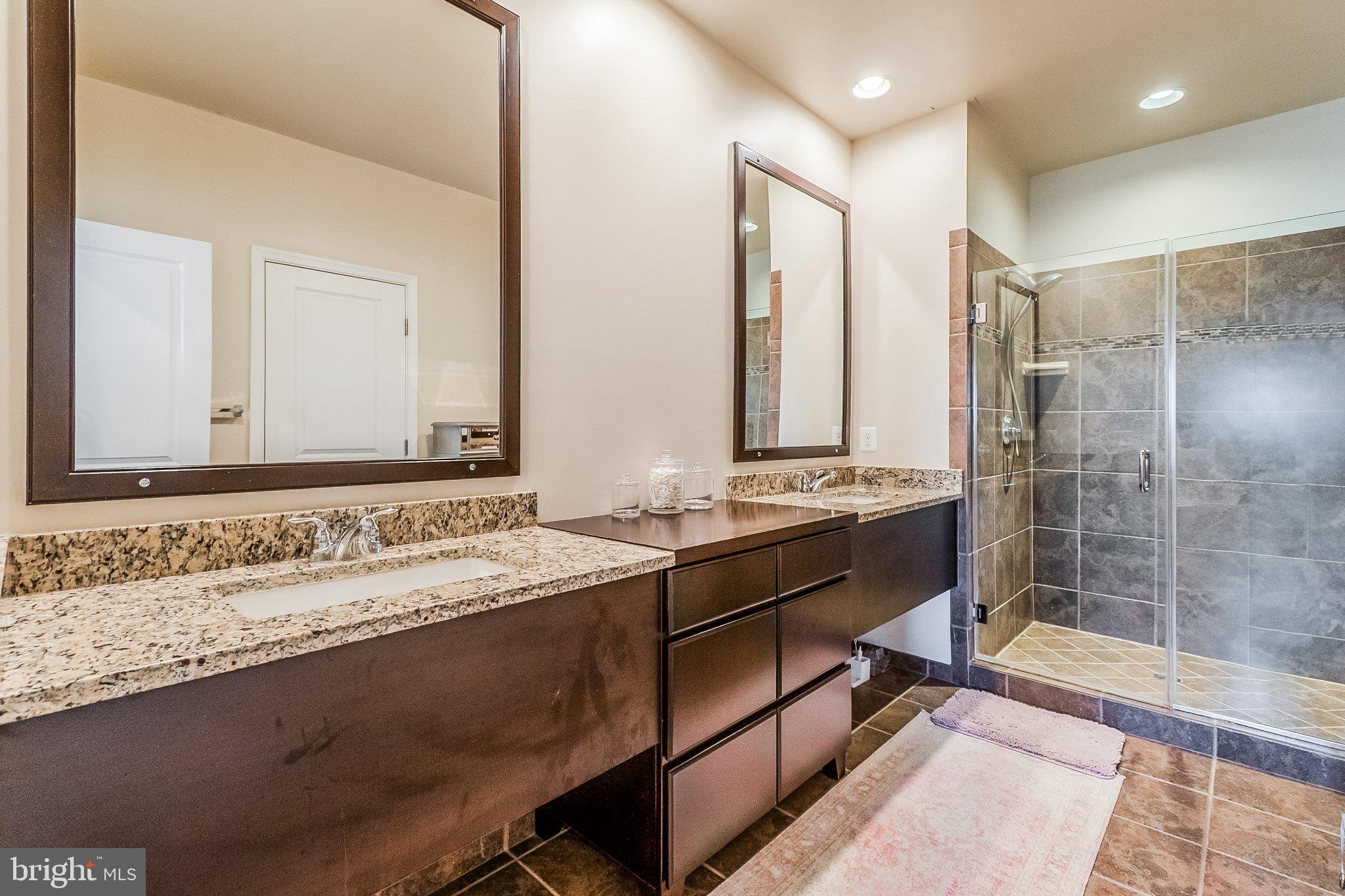 20401 Codman Drive Ashburn, VA 20147 - Photo 12 of 20 Sleek modern bathroom with elegant finishes.