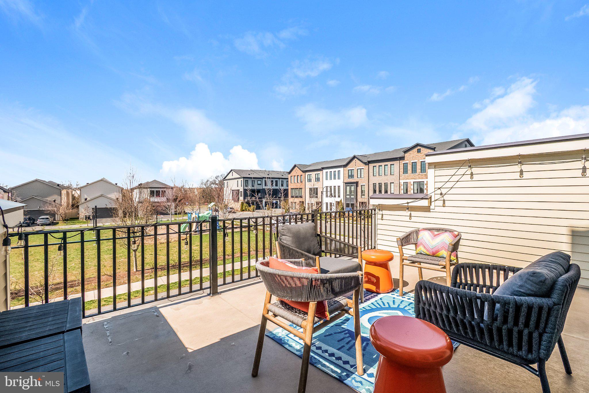 20401 Codman Drive Ashburn, VA 20147 - Photo 9 of 20 Sunny balcony with scenic views.