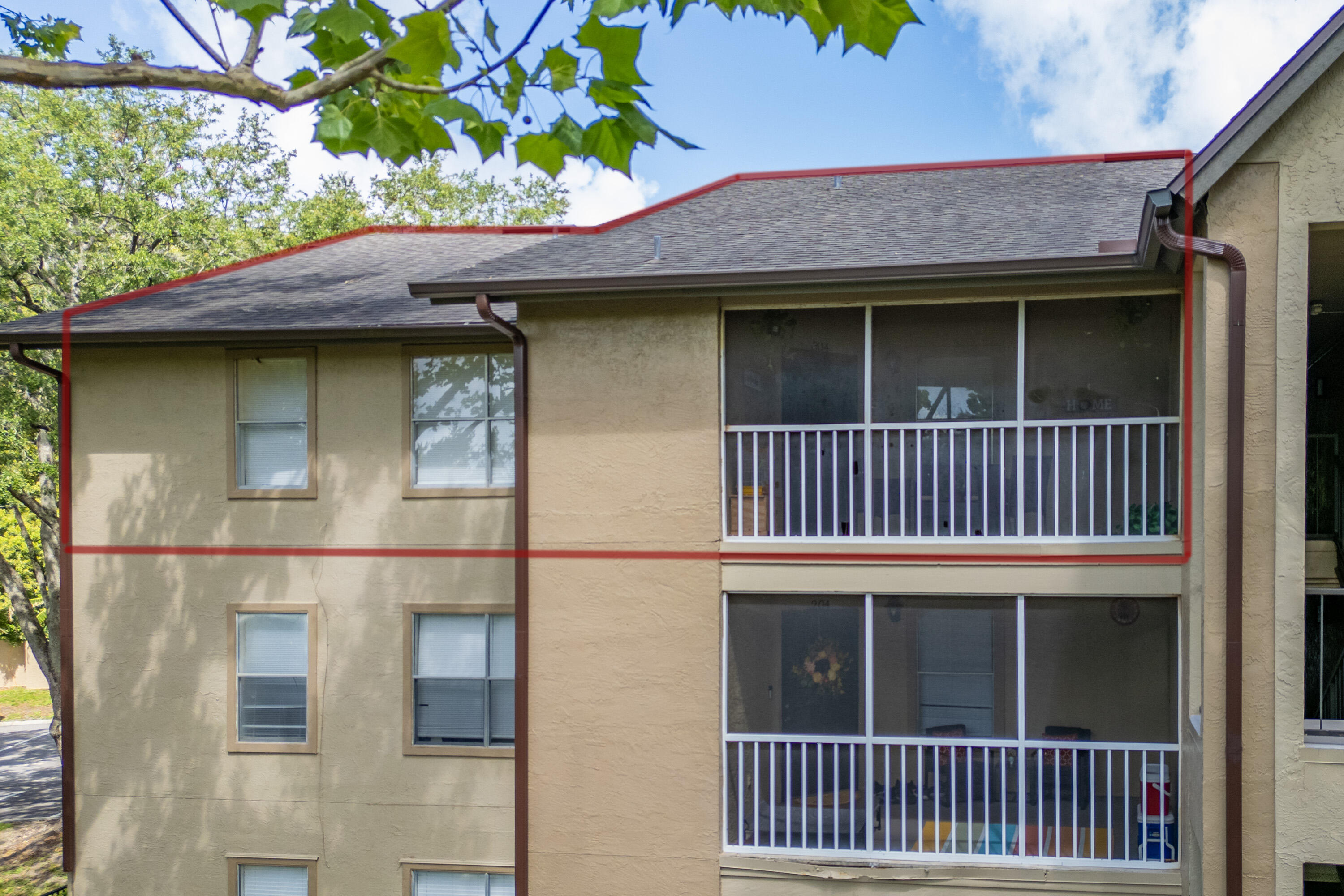 627 Dory Lane, Unit 304 Altamonte Springs, FL 32714 - Photo 23 of 29 a front view of a house with a yard