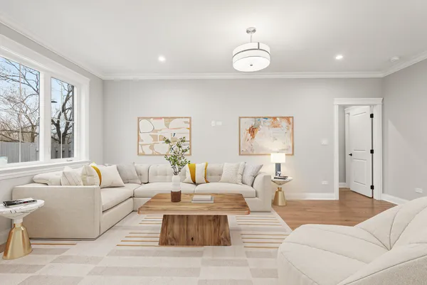 a living room with furniture and a large window