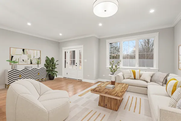 a bedroom with furniture and wooden floor