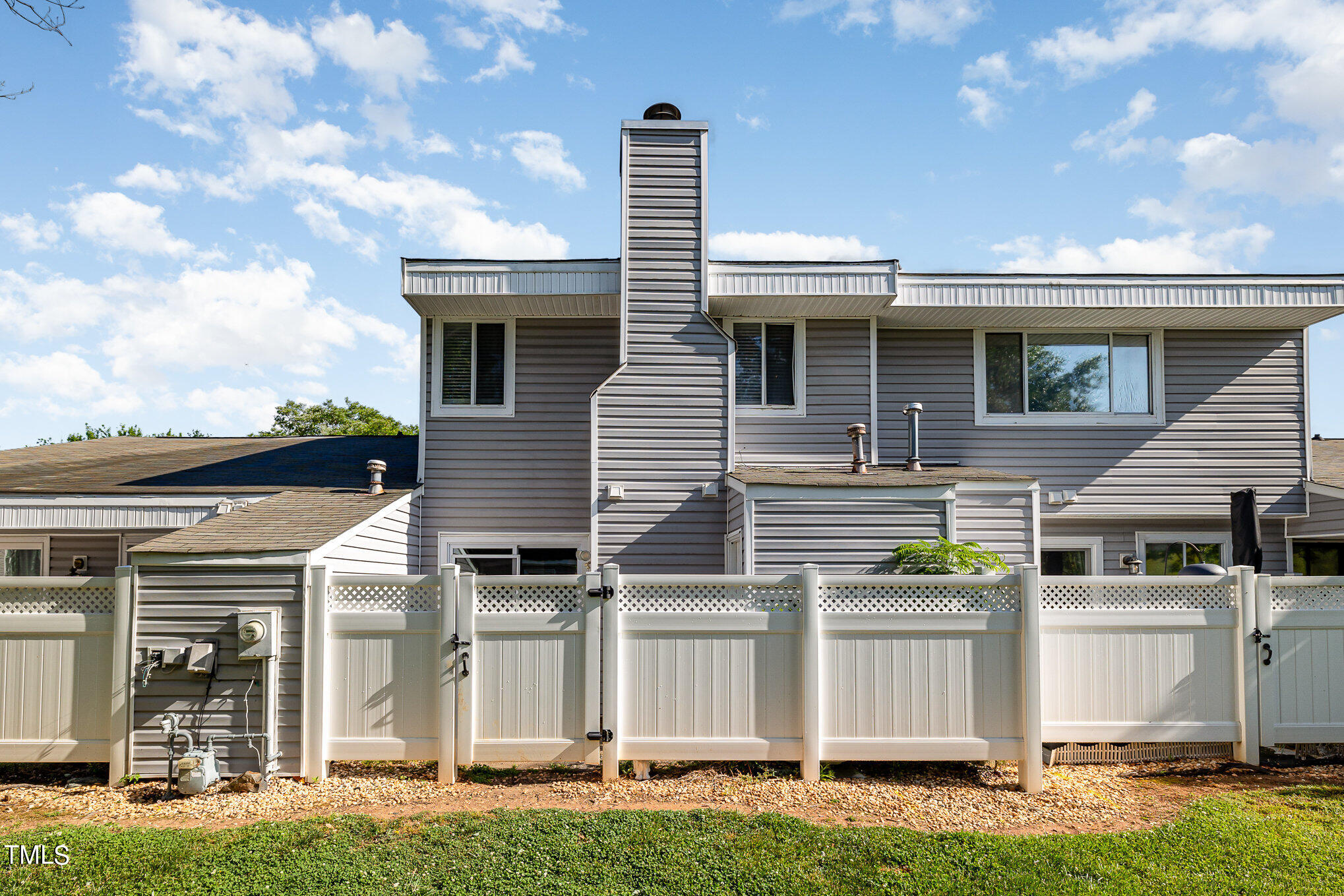 3702 San Pablo Drive Raleigh, NC 27616 - Photo 22 of 26 a front view of a house with garden