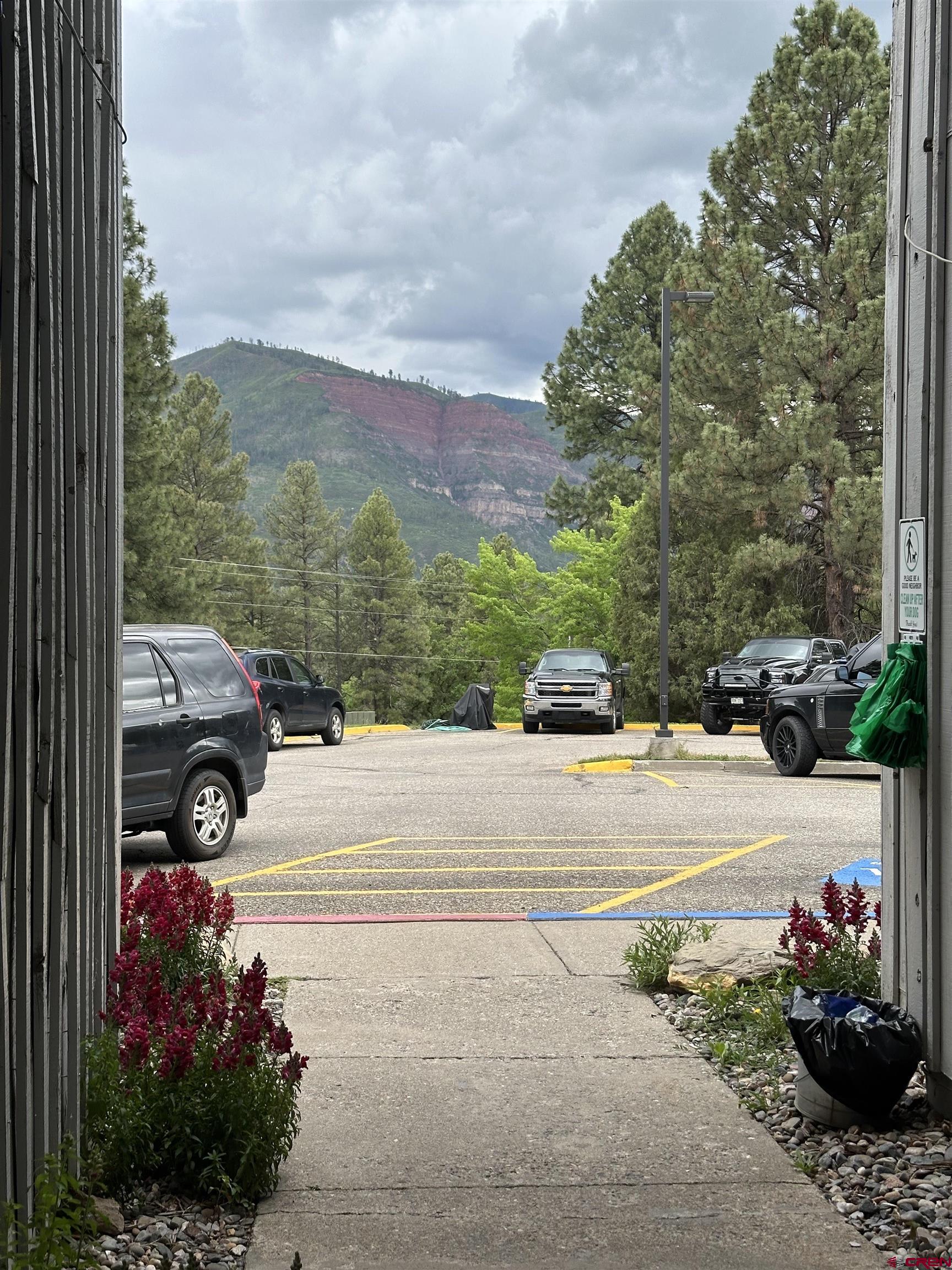 34237 Highway 550, Unit 22 Durango, CO 81301 - Photo 2 of 17 a view of a street with cars park side of the road