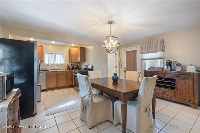 a view of kitchen with breakfast area