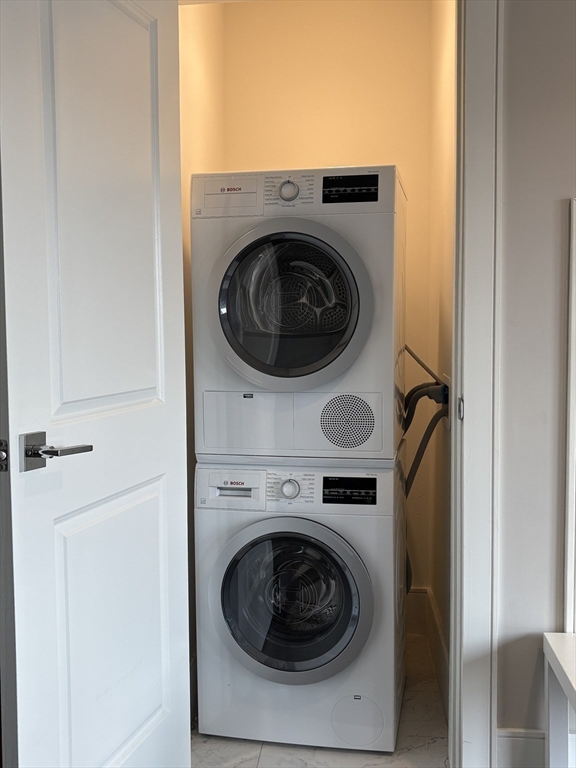 214 Market Street, Unit 405 Boston, MA 02135 - Photo 18 of 22 a utility room with dryer and washer