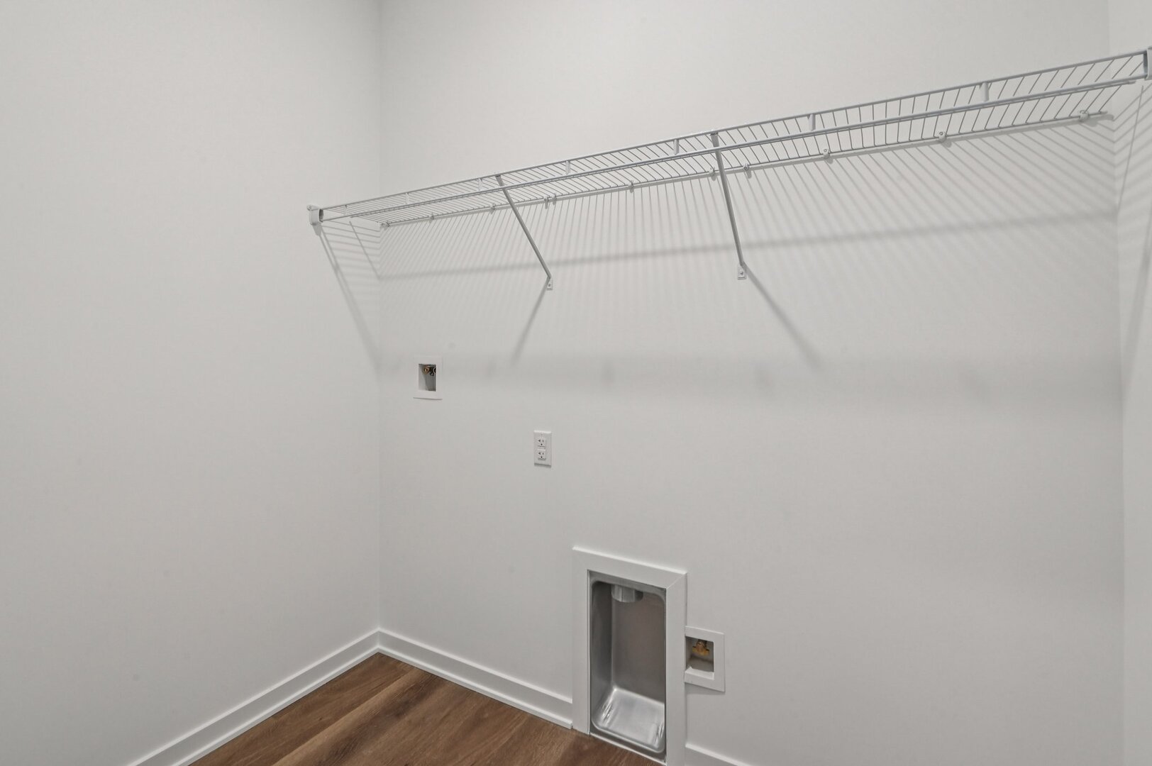 809 Mesa Lane Pingree Grove, IL 60140 - Photo 11 of 53 a view of a room with racks on the wall