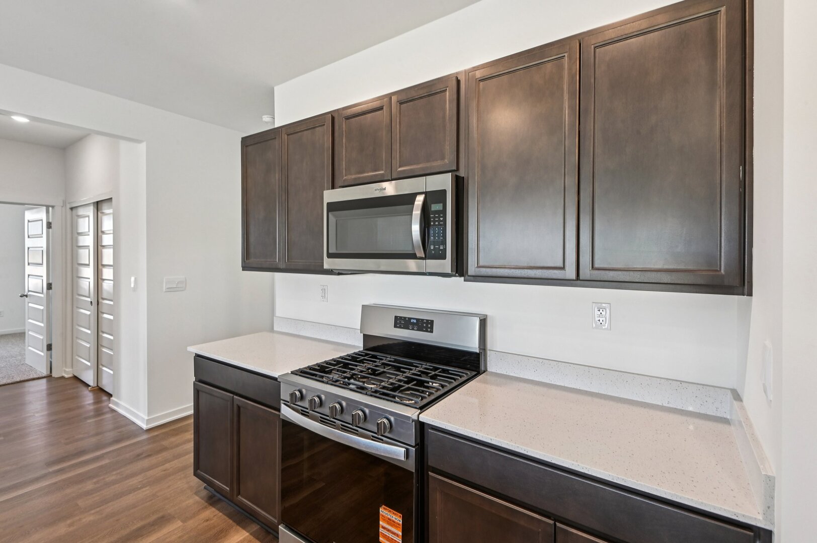809 Mesa Lane Pingree Grove, IL 60140 - Photo 17 of 53 a kitchen with a stove and a microwave