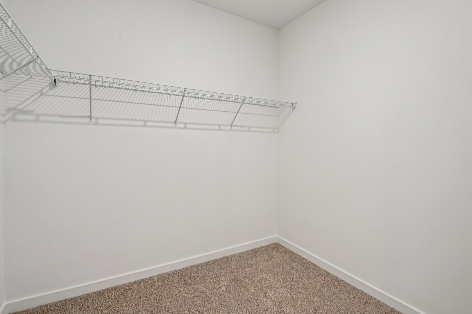 809 Mesa Lane Pingree Grove, IL 60140 - Photo 31 of 53 a view of a room with racks on the wall