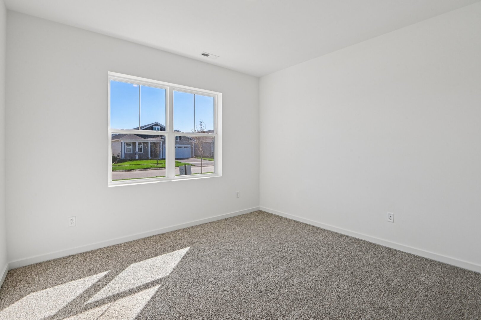 809 Mesa Lane Pingree Grove, IL 60140 - Photo 5 of 53 a view of an empty room with a window