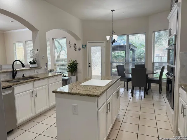 a bedroom with bed and a window