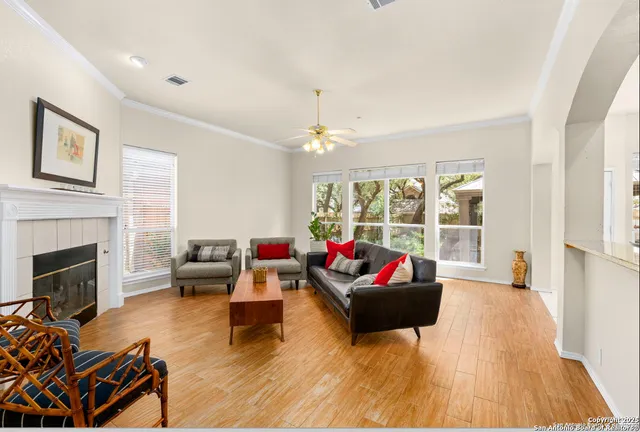 a living room with furniture and a rug