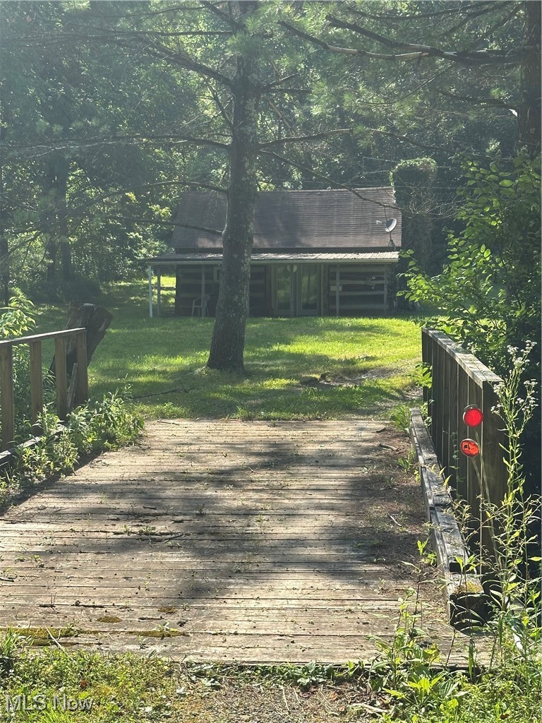 37114 Barber Ridge Road Woodsfield, OH 43793 - Photo 3 of 50 Cross over town fork creek on a wooden bridge to property