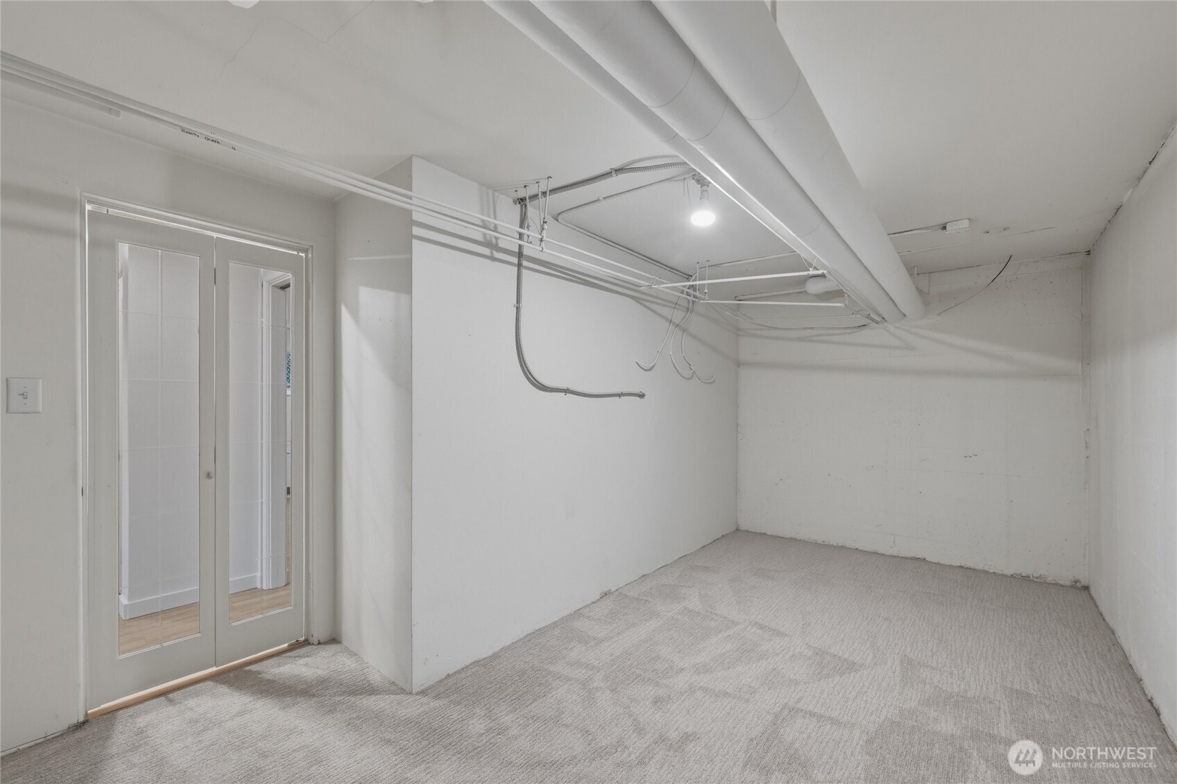 901 North Forest Street, Unit 134 Bellingham, WA 98225 - Photo 24 of 39 a view of a room with racks on the wall