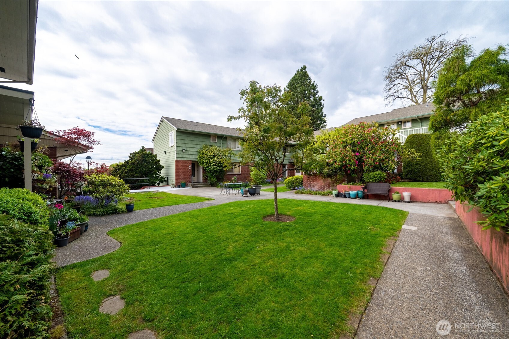 901 North Forest Street, Unit 134 Bellingham, WA 98225 - Photo 34 of 39 a view of a garden with a fountain