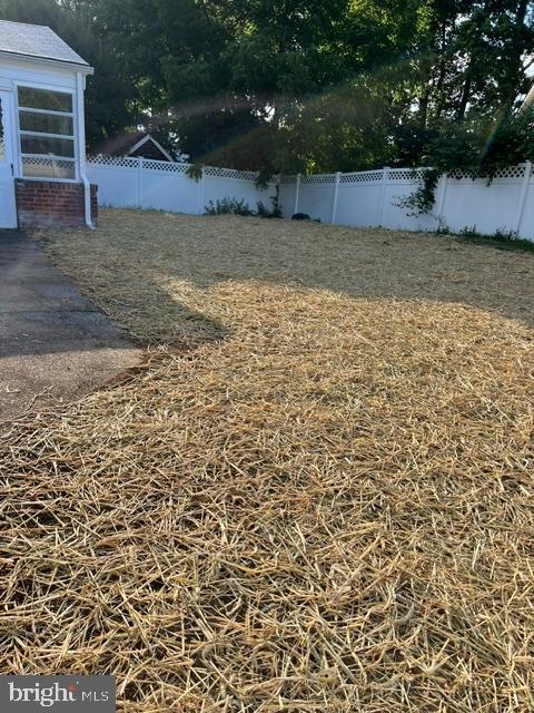 108 Kingbrook Road Linthicum Heights, MD 21090 - Photo 15 of 15 a view of a yard with wooden fence