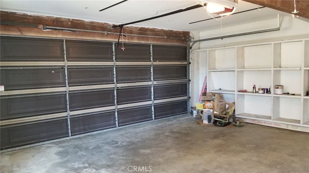 4640 Eastbourne Bay Oxnard, CA 93035 - Photo 16 of 16 a view of a room with shelves on the wall
