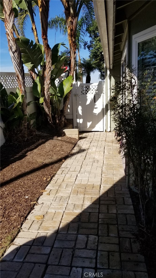 4640 Eastbourne Bay Oxnard, CA 93035 - Photo 3 of 16 a view of a pathway both side of building