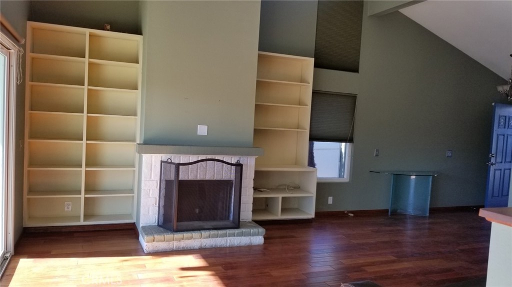 4640 Eastbourne Bay Oxnard, CA 93035 - Photo 5 of 16 a view of a livingroom with wooden floor and staircase