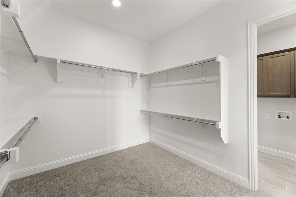 2219 Wickersham Road Rockwall, TX 75087 - Photo 15 of 37 Primary Closet - Representative Photo