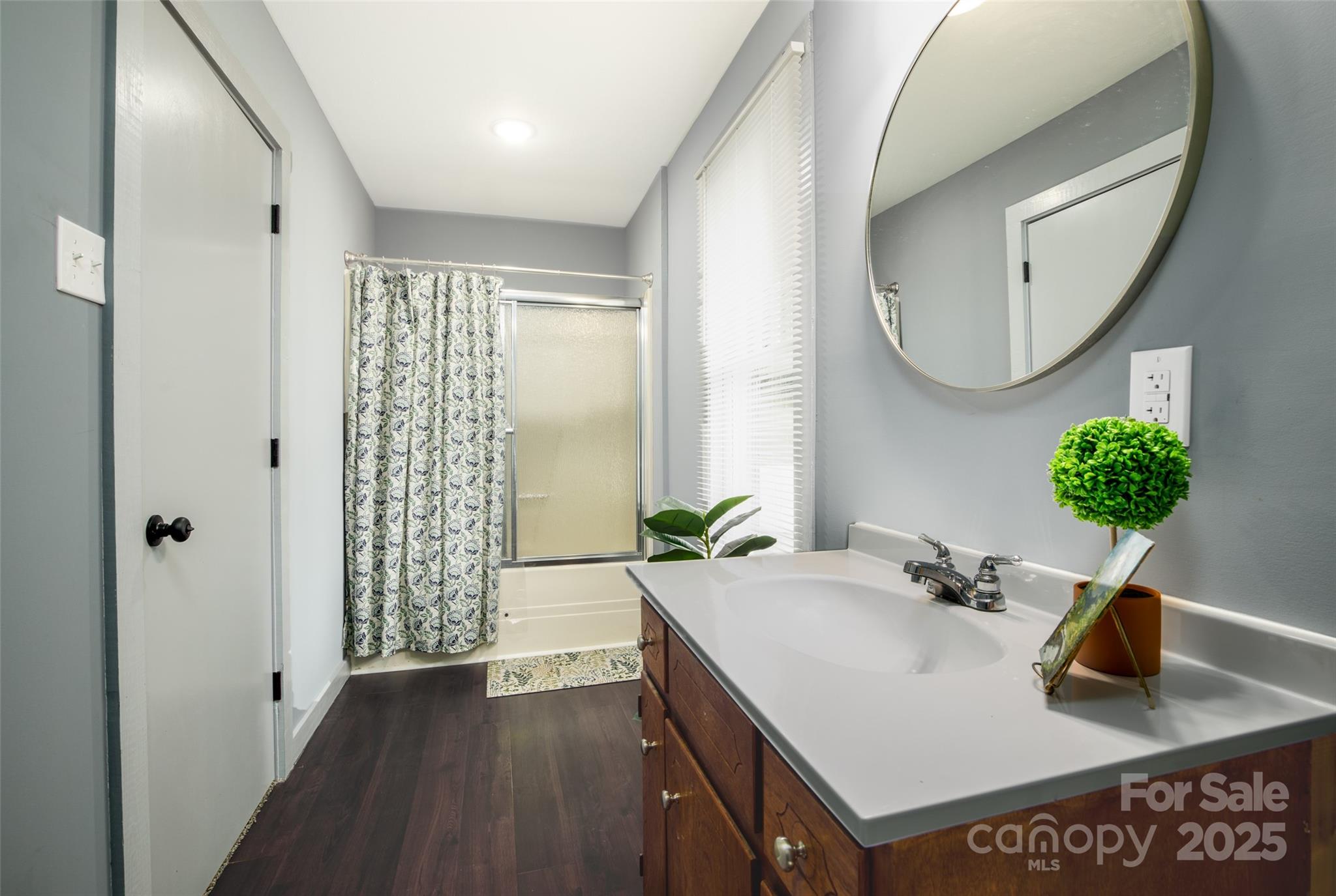 2326 Morganton Boulevard Southwest Lenoir, NC 28645 - Photo 11 of 34 a bathroom with a sink and a mirror