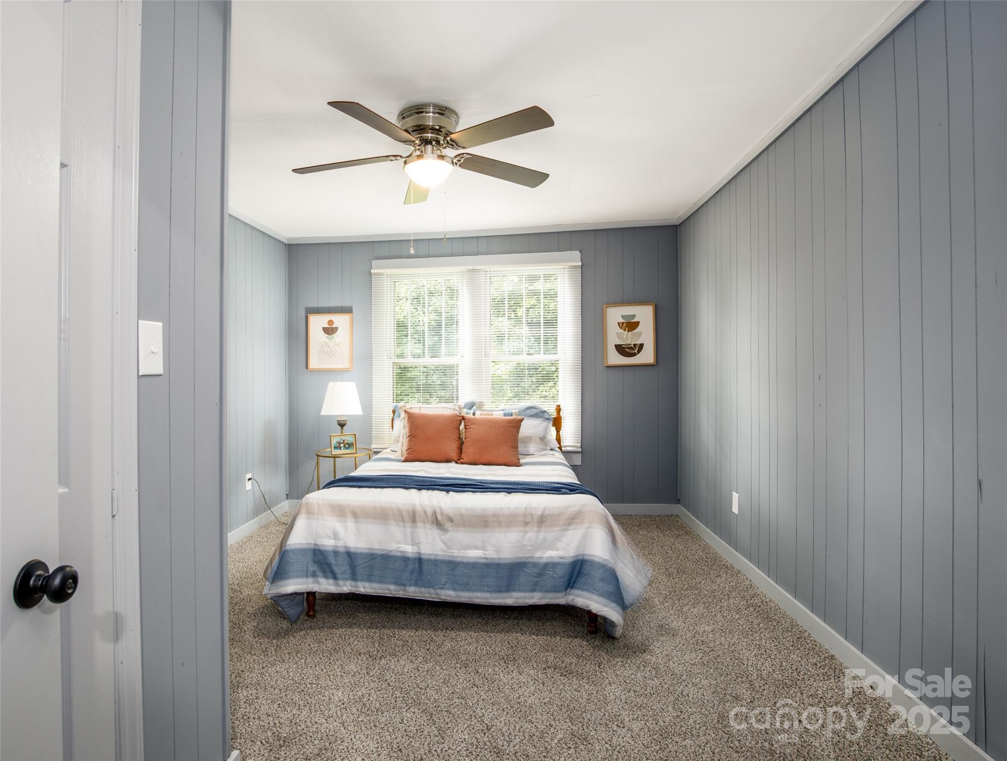 2326 Morganton Boulevard Southwest Lenoir, NC 28645 - Photo 12 of 34 a bedroom with a bed and window