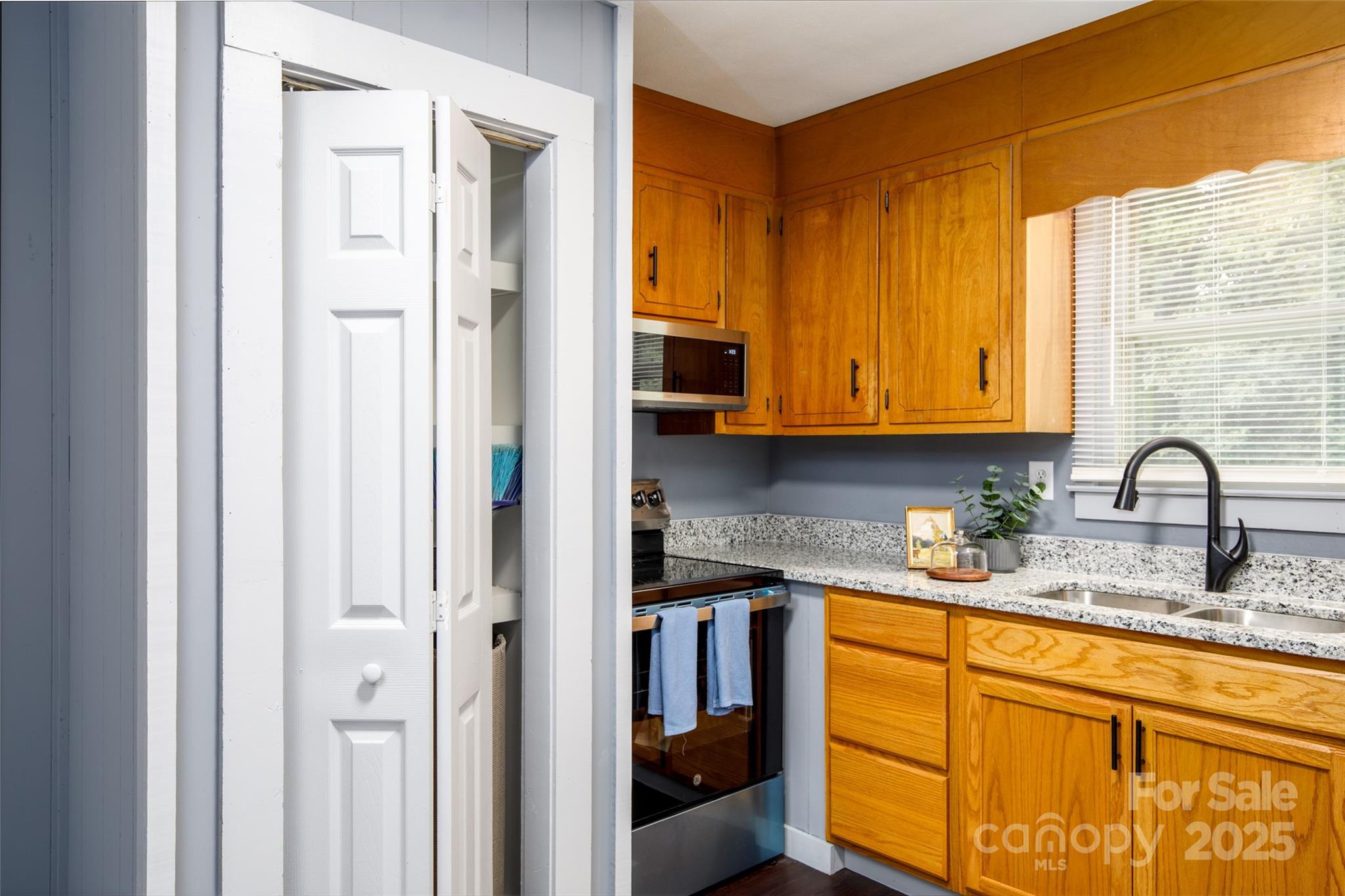 2326 Morganton Boulevard Southwest Lenoir, NC 28645 - Photo 18 of 34 a kitchen with stainless steel appliances granite countertop a refrigerator and a sink
