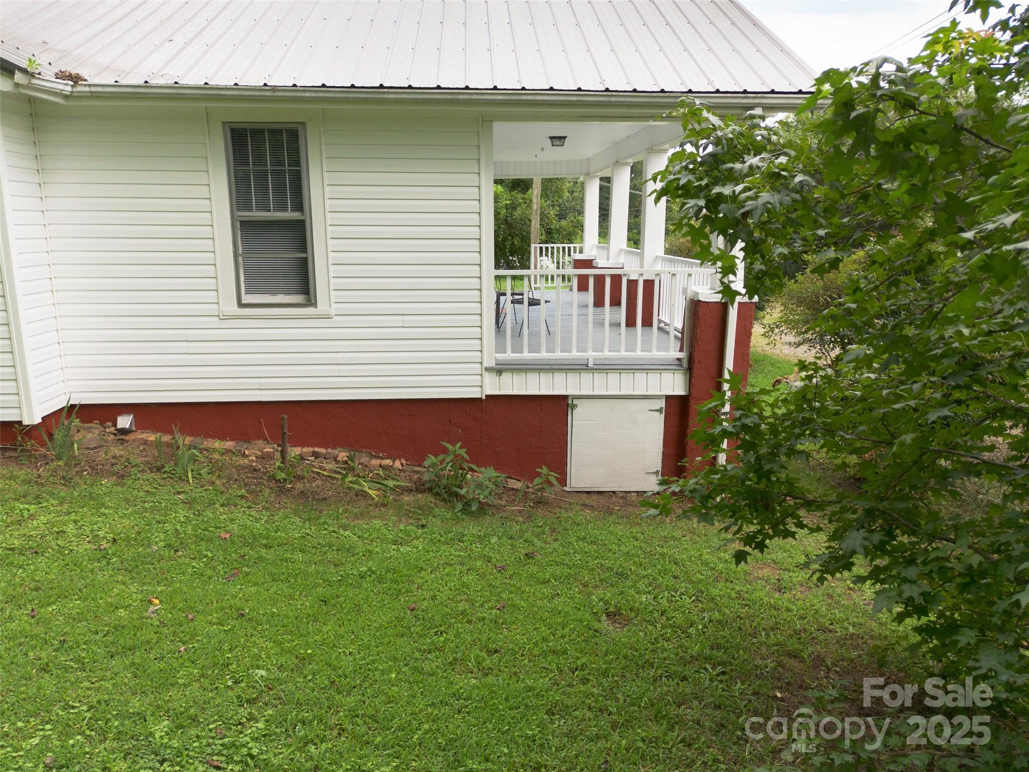 2326 Morganton Boulevard Southwest Lenoir, NC 28645 - Photo 27 of 34 a front view of house with yard